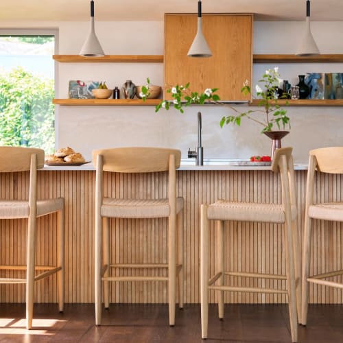 JUST LAUNCHED. Meet the new Butter Kitchen Stools. All the solid oak suaveness of our popular Butter Chairs, now brought to the kitchen counter. You’ll melt into them like butter on a freshly toasted crumpet.

Bar stools, kitchen stools, counter stools, kitchen island seating, breakfast bar seating, kitchen inspiration, dining furniture, hand-woven cord seat, solid oak furniture, comfy product.