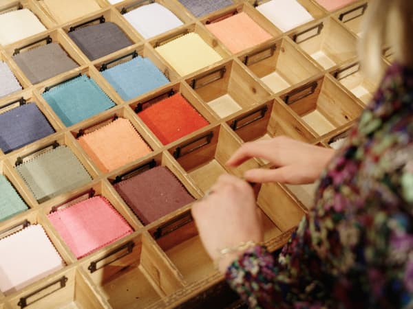 Choosing fabric swatches at St Albans Shack