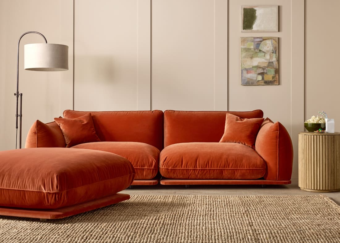 Blockbuster Modular Sofa + Footstool in Broken Pot Orange Velvet
