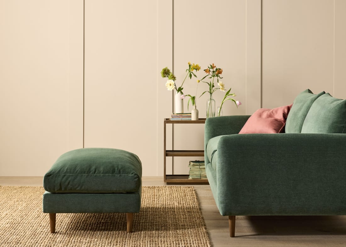 Squishmeister Footstool in Secret Garden Green Chenille