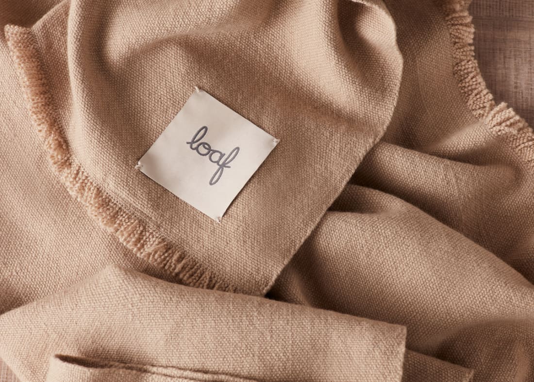 Nuzzler Merino Wool Blanket 170 x 180 cm in Taupe